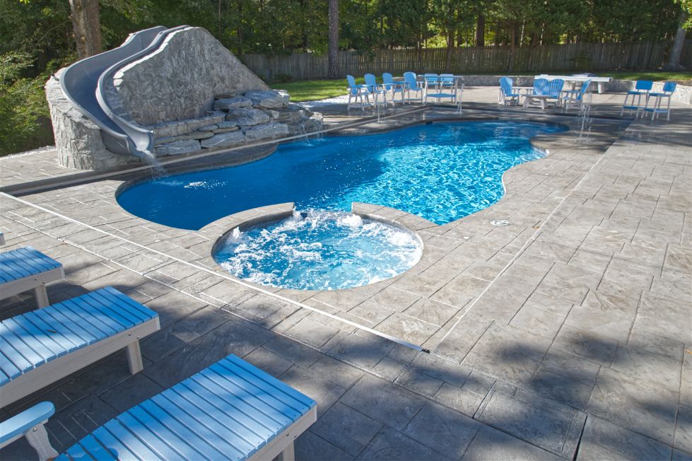 Custom pool with spa and rock slide