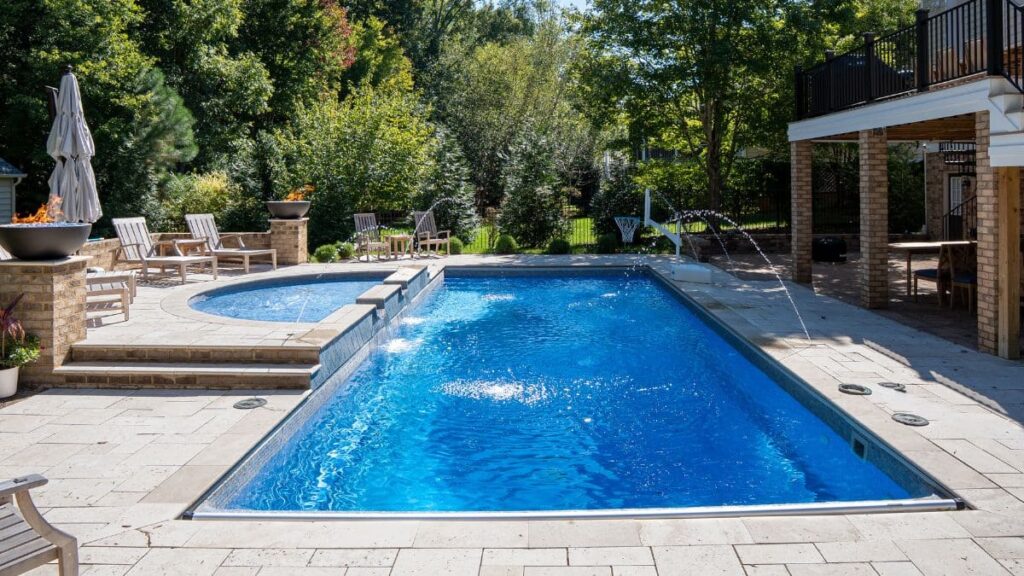 Backyard swimming pool with clear blue water